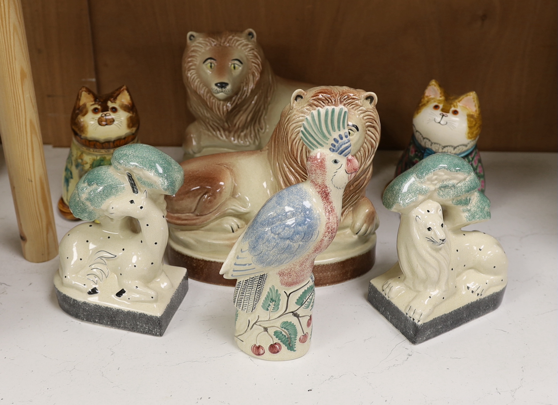 A group of Rye pottery animals, including two Joan and David De Bethel, Rye